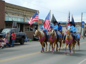 East Helena Valley Rodeo Parade, flag precession with U.S. flags.