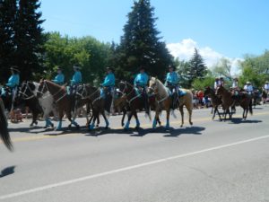 East Helena Valley Rodeo Parade, a line of riders atop their horses