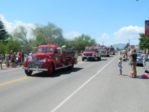 East Helena Valley Rodeo Parade, a precession of East Helena Volunteer Fire Department Fire Trucks.